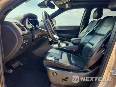 Zdjęcie 7 z 13 samochodu: 2014 JEEP GRAND CHEROKEE SUMMIT VIN:1C4RJEJT2EC359592 - miniatura