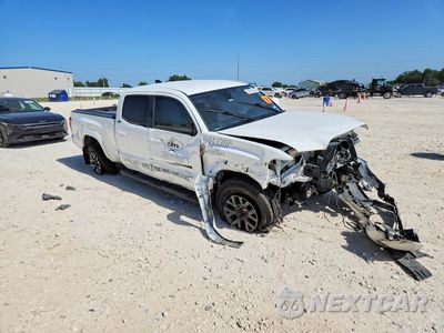 Czwarte zdjęcie samochodu z boku: 2021 TOYOTA TACOMA SR5 V6 VIN:3TMBZ5DN9MM031090 - miniatura