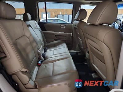 Zdjęcie 11 z 13 samochodu: 2009 HONDA PILOT EXL VIN:5FNYF38589B012494 - miniatura