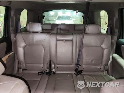 Zdjęcie 10 z 14 samochodu: 2011 HONDA PILOT EXL VIN:5FNYF4H65BB007354 - miniatura