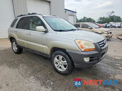 Czwarte zdjęcie samochodu z boku: 2006 KIA SPORTAGE LX VIN:KNDJE723267172424 - miniatura