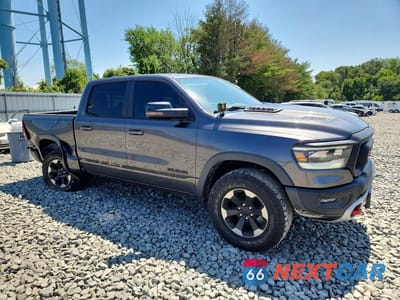 Czwarte zdjęcie samochodu z boku: 2019 RAM 1500 REBEL VIN:1C6SRFLTXKN551055 - miniatura