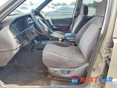 Zdjęcie 7 z 13 samochodu: 1997 JEEP GRAND CHEROKEE LAREDO VIN:1J4FX58S9VC726870 - miniatura