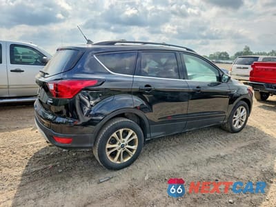 Trzecie zdjęcie samochodu z tyłu: 2019 FORD ESCAPE SEL VIN:1FMCU9HD2KUB32469 - miniatura