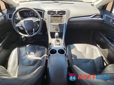 Zdjęcie 8 z 12 samochodu: 2014 FORD FUSION TITANIUM PHEV VIN:3FA6P0SU7ER136094 - miniatura