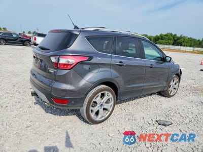 Trzecie zdjęcie samochodu z tyłu: 2018 FORD ESCAPE TITANIUM VIN:1FMCU0J97JUB66889 - miniatura