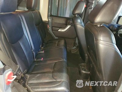 Zdjęcie 10 z 12 samochodu: 2013 JEEP WRANGLER UNLIMITED RUBICON VIN:1C4BJWFGXDL689501 - miniatura
