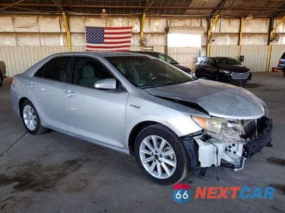 Czwarte zdjęcie samochodu z boku: 2012 TOYOTA CAMRY HYBRID XLE VIN:4T1BD1FK0CU046898 - miniatura