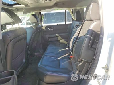 Zdjęcie 11 z 13 samochodu: 2012 HONDA PILOT TOURING VIN:5FNYF4H97CB010302 - miniatura