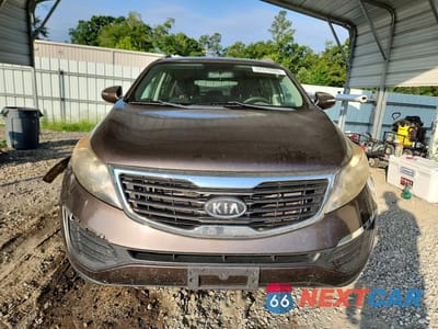 Piąte zdjęcie samochodu w środku: 2012 KIA SPORTAGE LX VIN:KNDPB3A21C7194656 - miniatura