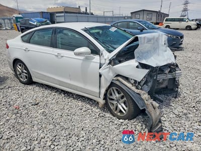 Czwarte zdjęcie samochodu z boku: 2016 FORD FUSION SE VIN:3FA6P0H77GR175496 - miniatura