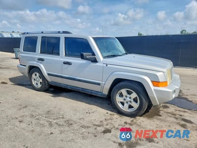 Czwarte zdjęcie samochodu z boku: 2006 JEEP COMMANDER VIN:1J8HH48K86C203470 - miniatura