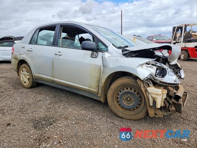 Czwarte zdjęcie samochodu z boku: 2011 NISSAN VERSA 1.8 S VIN:3N1BC1AP8BL442034 - miniatura