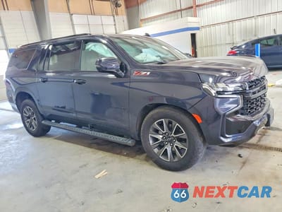 Czwarte zdjęcie samochodu z boku: 2024 CHEVROLET SUBURBAN K1500 Z71 VIN:1GNSKDKD7RR109792 - miniatura