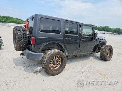 Trzecie zdjęcie samochodu z tyłu: 2016 JEEP WRANGLER UNLIMITED SPORT VIN:1C4BJWDG4GL130906 - miniatura