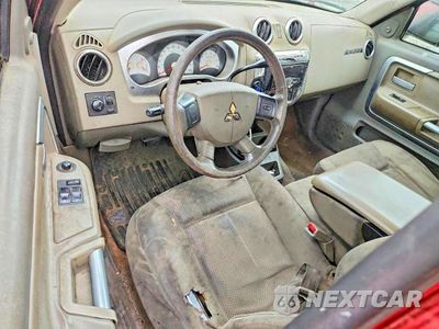 Zdjęcie 8 z 11 samochodu: 2006 MITSUBISHI RAIDER DUROCROSS VIN:1Z7HC32N56S529188 - miniatura