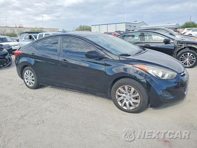 Czwarte zdjęcie samochodu z boku: 2012 HYUNDAI ELANTRA GLS VIN:KMHDH4AE9CU228972 - miniatura