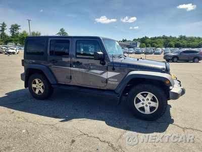 Czwarte zdjęcie samochodu z boku: 2017 JEEP WRANGLER UNLIMITED SPORT VIN:1C4BJWDGXHL549652 - miniatura