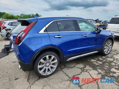 Trzecie zdjęcie samochodu z tyłu: 2021 CADILLAC XT4 PREMIUM LUXURY VIN:1GYFZDR46MF000028 - miniatura