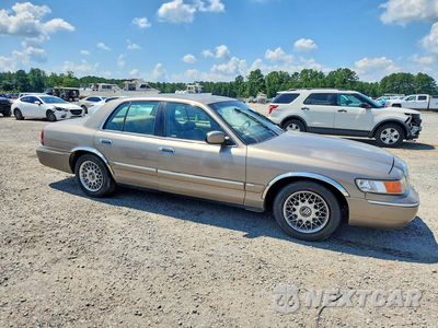 Czwarte zdjęcie samochodu z boku: 2001 MERCURY 190D VIN:2MEFM74WX1X630759 - miniatura