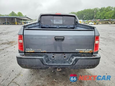 Zdjęcie 6 z 13 samochodu: 2010 HONDA RIDGELINE RT VIN:5FPYK1F24AB001996 - miniatura