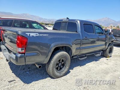 Trzecie zdjęcie samochodu z tyłu: 2016 TOYOTA TACOMA TRD SPORT VIN:3TMBZ5DN1GM005636 - miniatura