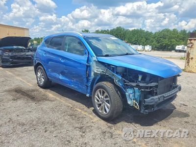 Czwarte zdjęcie samochodu z boku: 2017 HYUNDAI TUCSON SE VIN:KM8J33A46HU487929 - miniatura