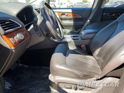 Zdjęcie 7 z 13 samochodu: 2013 LINCOLN MKX VIN:2LMDJ6JK8DBL32905 - miniatura