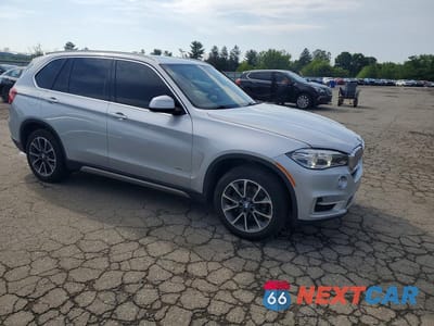 Czwarte zdjęcie samochodu z boku: 2017 BMW X5 XDRIVE35I VIN:5UXKR0C35H0V73863 - miniatura
