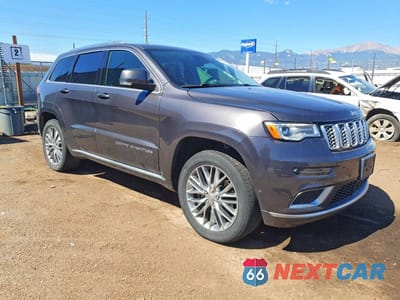 Czwarte zdjęcie samochodu z boku: 2018 JEEP GRAND CHEROKEE SUMMIT VIN:1C4RJFJT6JC130140 - miniatura