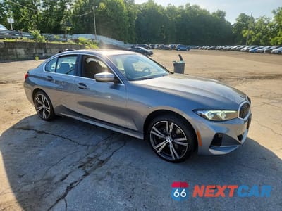 Czwarte zdjęcie samochodu z boku: 2024 BMW 330XI VIN:3MW89FF01R8E24502 - miniatura