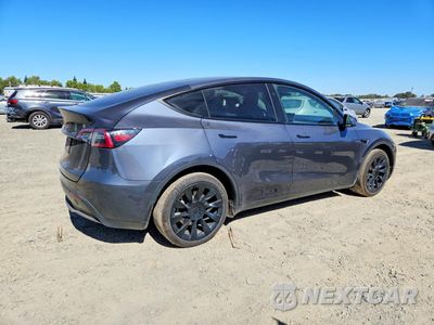 Trzecie zdjęcie samochodu z tyłu: 2023 TESLA MODEL Y VIN:7SAYGDEE3PA146334 - miniatura