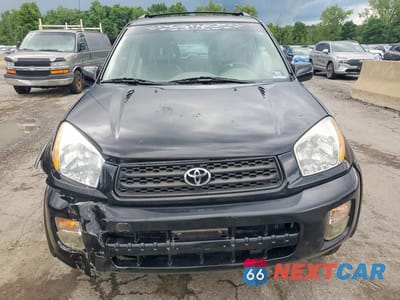 Piąte zdjęcie samochodu w środku: 2003 TOYOTA RAV4 BASE VIN:JTEHH20V536089189 - miniatura