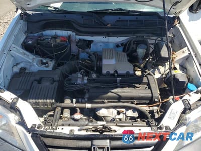 Zdjęcie 12 z 13 samochodu: 1999 HONDA CR-V LX VIN:JHLRD1840XC030524 - miniatura