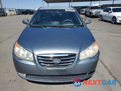 Piąte zdjęcie samochodu w środku: 2010 HYUNDAI ELANTRA GLS VIN:KMHDU4AD5AU112068 - miniatura