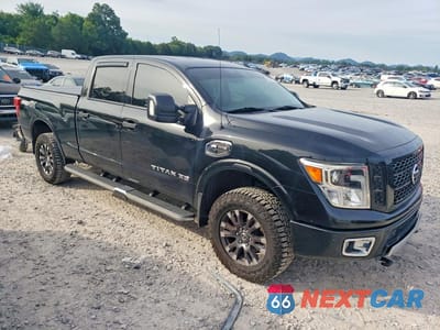 Czwarte zdjęcie samochodu z boku: 2018 NISSAN TITAN XD VIN:1N6BA1F49JN519085 - miniatura