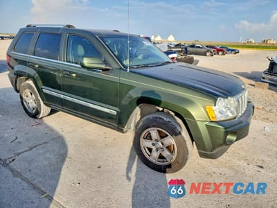 Czwarte zdjęcie samochodu z boku: 2007 JEEP GRAND CHEROKEE OVERLAND VIN:1J8HS68257C653026 - miniatura