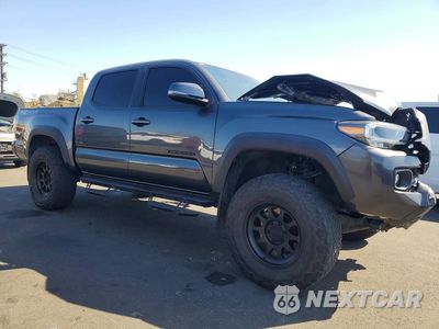 Czwarte zdjęcie samochodu z boku: 2022 TOYOTA TACOMA TRD OFF-ROAD VIN:3TMCZ5AN8NM507808 - miniatura