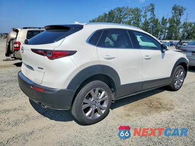 Trzecie zdjęcie samochodu z tyłu: 2023 MAZDA CX-30 PREMIUM VIN:3MVDMBDM5PM576199 - miniatura