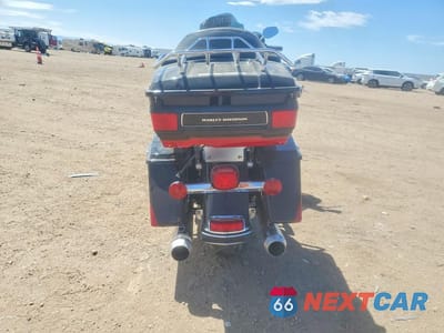 Czwarte zdjęcie samochodu z boku: 2010 HARLEY-DAVIDSON FLHTK VIN:1HD1KEM31AB639850 - miniatura