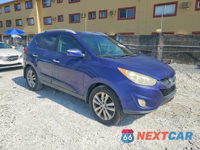 Czwarte zdjęcie samochodu z boku: 2013 HYUNDAI TUCSON LIMITED VIN:KM8JU3AC1DU548991 - miniatura
