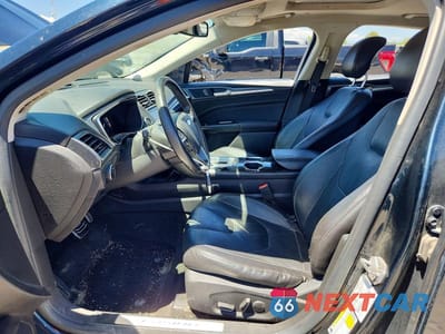 Zdjęcie 7 z 12 samochodu: 2014 FORD FUSION TITANIUM PHEV VIN:3FA6P0SU7ER136094 - miniatura