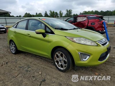 Czwarte zdjęcie samochodu z boku: 2011 FORD FIESTA VIN:3FADP4CJ7BM111157 - miniatura