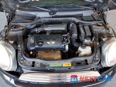 Zdjęcie 11 z 12 samochodu: 2011 MINI COOPER VIN:WMWSU3C5XBT092979 - miniatura