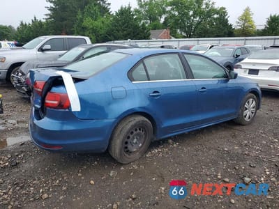 Trzecie zdjęcie samochodu z tyłu: 2017 VOLKSWAGEN JETTA S VIN:3VW2B7AJ8HM331403 - miniatura