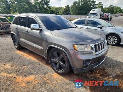 Czwarte zdjęcie samochodu z boku: 2011 JEEP GRAND CHEROKEE OVERLAND VIN:1J4RR6GT9BC583924 - miniatura