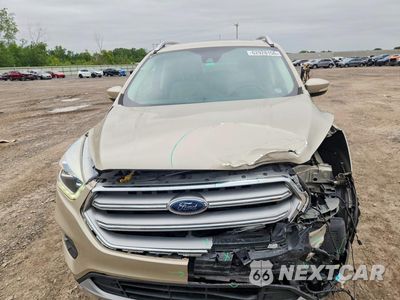 Piąte zdjęcie samochodu w środku: 2017 FORD ESCAPE TITANIUM VIN:1FMCU0J90HUB86055 - miniatura