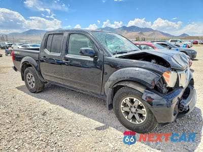 Czwarte zdjęcie samochodu z boku: 2019 NISSAN FRONTIER PRO-4X VIN:1N6AD0EV9KN710515 - miniatura
