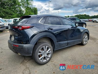Trzecie zdjęcie samochodu z tyłu: 2024 MAZDA CX-30 PREFERRED VIN:3MVDMBCM9RM656805 - miniatura