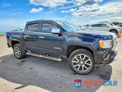 Czwarte zdjęcie samochodu z boku: 2018 GMC CANYON DENALI VIN:1GTG5EEN2J1208720 - miniatura